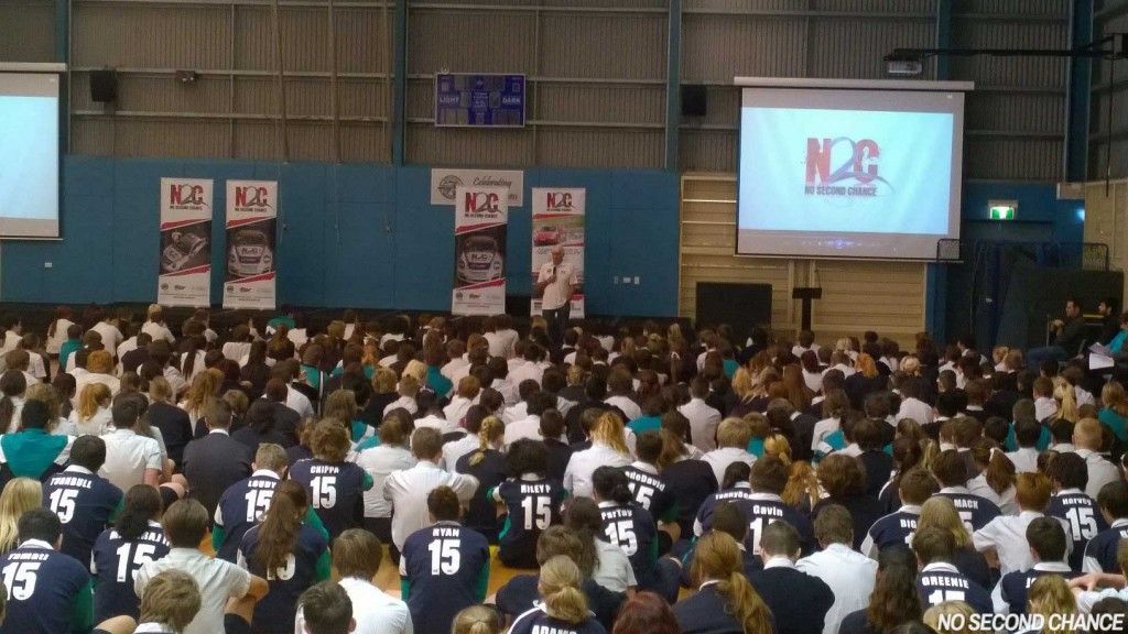 Warren Luff, Paul Stanley and Andy McElrea talk to students at Victoria Point SHS