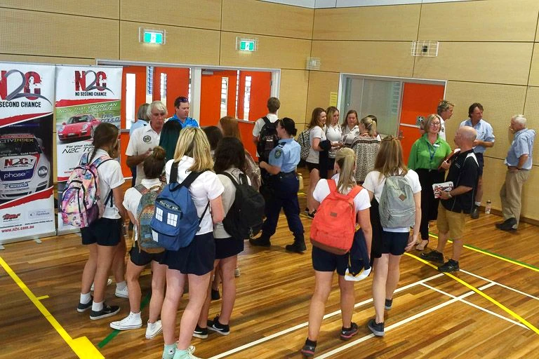 Students take a moment to ask questions after the presentation at Denison College Bathurst