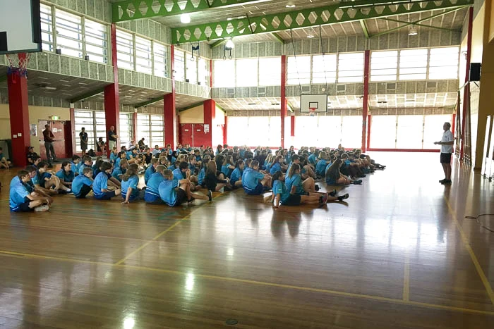 Warren Luff speaks to Palmerston Senior College students in the school gym