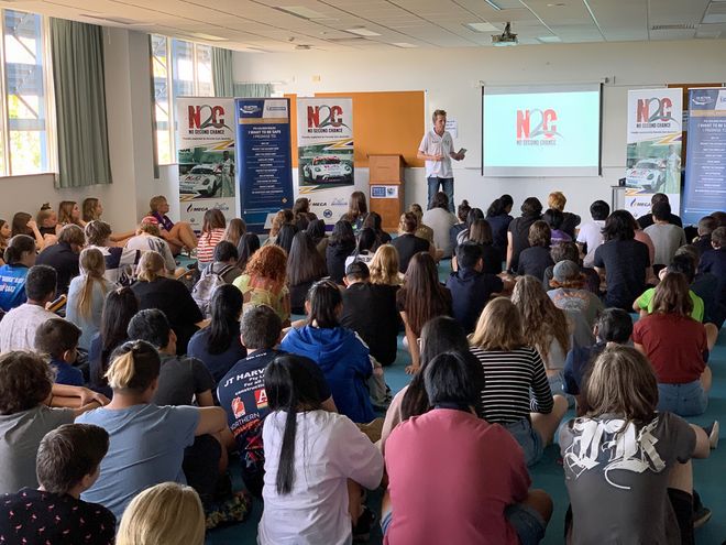 Warren Luff talks with the students at Darwin High School