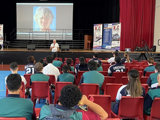 Paul Stanley talks with students from Groves Christian College